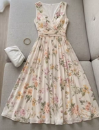 Kim - Sleeveless Floral Midi Dress